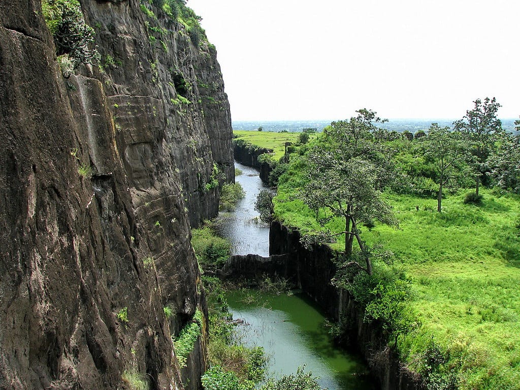Daulatabad Fort on a conical hilltop with ancient stone ramparts