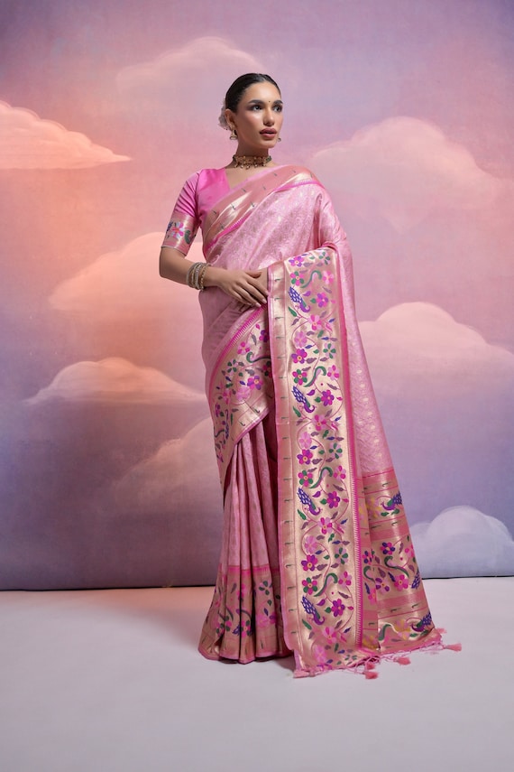 Handwoven Paithani silk saree with peacock and lotus motifs